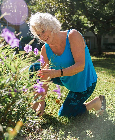 Woman kneeling comfortably while gardening