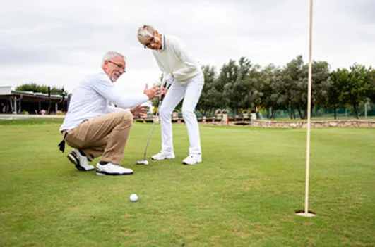Man enjoying a round of golf with comfortable joints