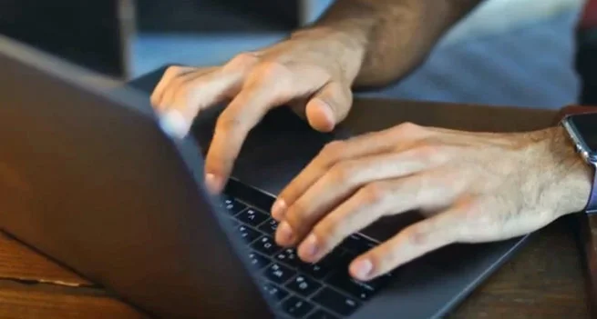 A person researching joint supplements on a laptop
