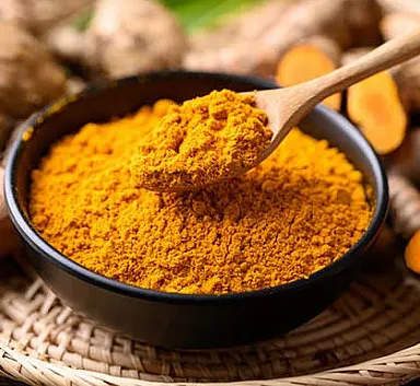 Fresh turmeric root and powder, a popular antioxidant botanical